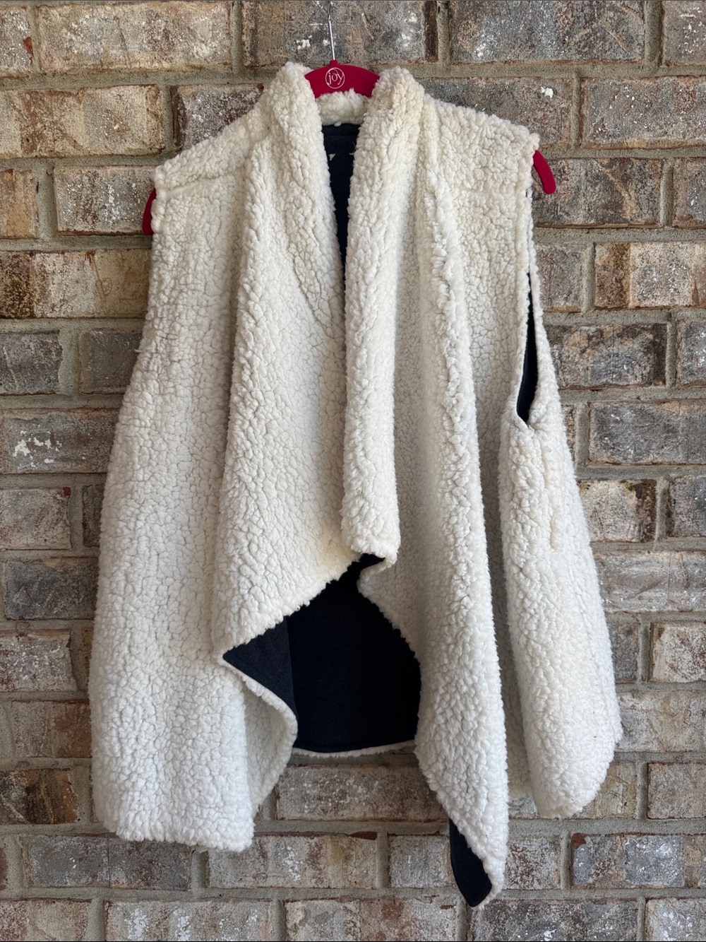 Plush Ivory Sherpa Draped Vest.